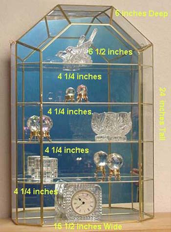 Really Big Brass and glass cabinet